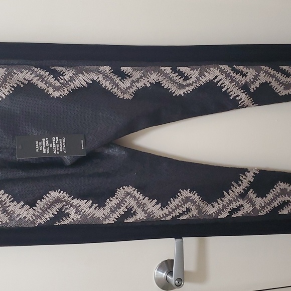 Black sequin pants with geometric design. - Picture 2 of 6